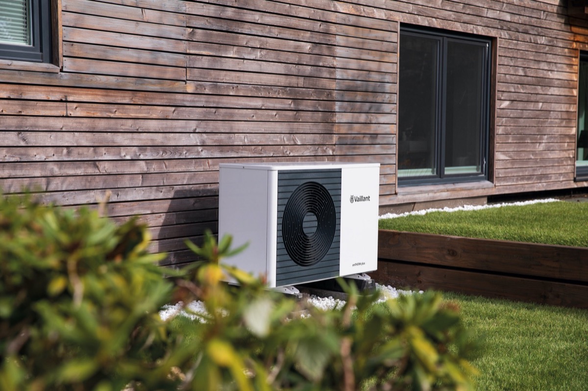 Vaillant heat pump on a rural timber-clad property